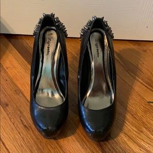 Black spiked heels
